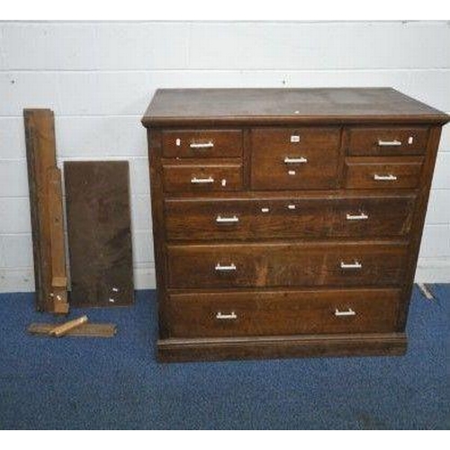 1200 - A 20TH CENTURY OAK SCOTTISH CHEST, with a deep drawer, flanked by two pairs of small drawers, above ... 