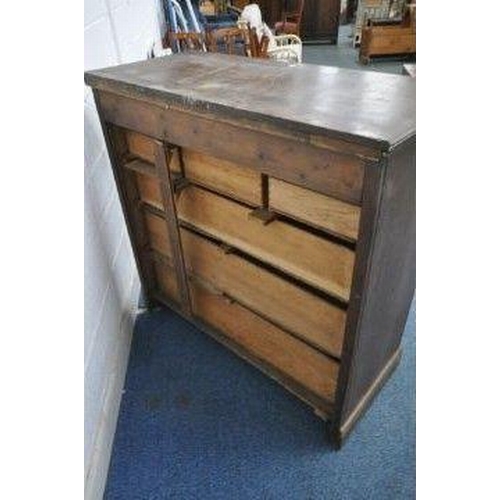 1200 - A 20TH CENTURY OAK SCOTTISH CHEST, with a deep drawer, flanked by two pairs of small drawers, above ... 