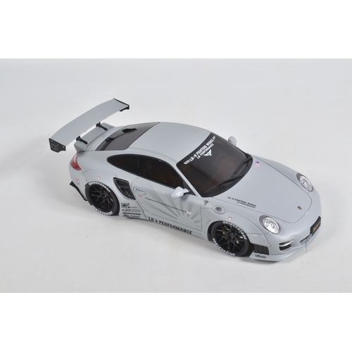 49 - TWO BOXED GT SPIRIT DIECAST PORSCHE 1:18 SCALE MODELS, to include a 2010 Porsche 997 LB Performance ... 