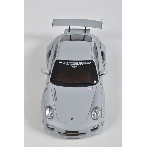 49 - TWO BOXED GT SPIRIT DIECAST PORSCHE 1:18 SCALE MODELS, to include a 2010 Porsche 997 LB Performance ... 