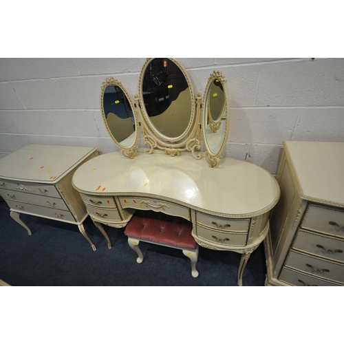 1202 - A VARIETY OF FRENCH CREAM BEDROOM FURNITURE, to include a kidney dressing table, with a triple dress... 