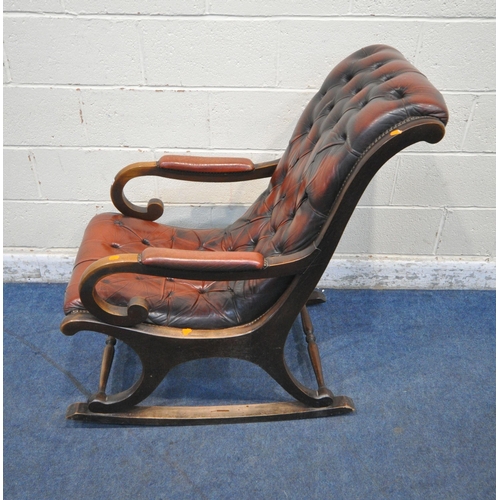 1210 - AN OXBLOOD BUTTONED LEATHER CHESTERFIELD STYLE SLIPPER ROCKING CHAIR, with open armrests, width 59cm... 