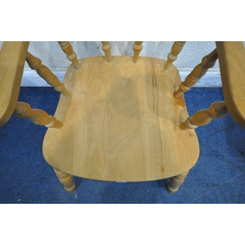 1224 - A LATE 20TH CENTURY BEECH BOW TOP SMOKERS CHAIR, the swept armrests with turned supports, raised on ... 