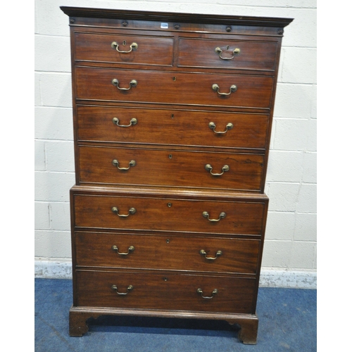 1229 - A GEORGIAN MAHOGANY CHEST ON CHEST, fitted with two short over six long drawers, raised on bracket f... 