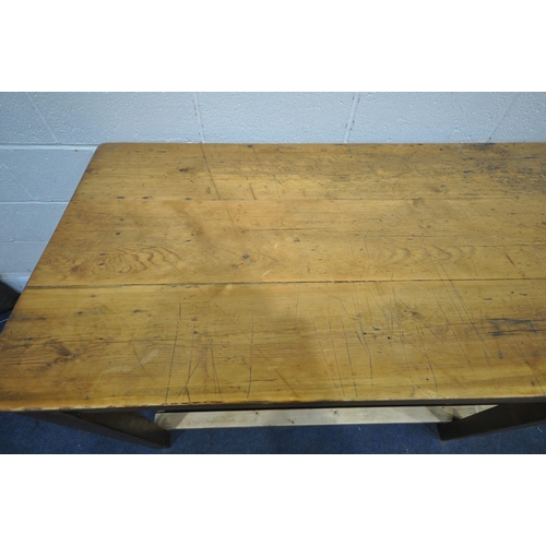 1248 - A LARGE PINE RECTANGULAR FARMHOUSE STYLE ISLAND TABLE, raised on six square tapered legs, united by ... 