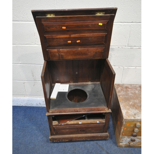 1254 - A LATE 20TH CENTURY OAK MEDIA CABINET, with a hinged lid, single lead glazed door, above a linenfold... 