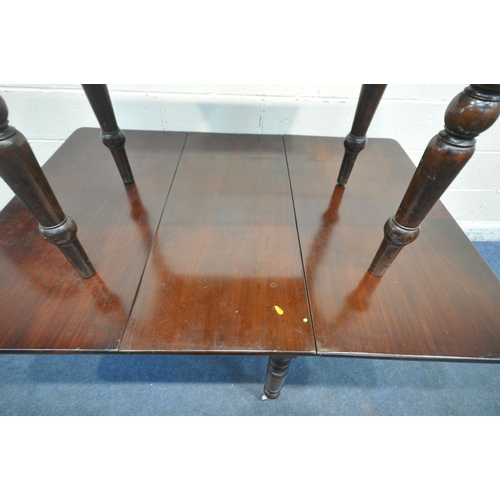 1256 - AN EARLY 20TH CENTURY MAHOGANY DROP LEAF TABLE, raised on turned legs, open width 147cm x closed wid... 