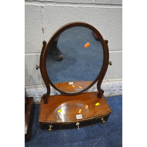 1258 - A 19TH CENTURY MAHOGANY DRESSING TABLE MIRROR, with a bow front base, fitted with three drawers, alo... 