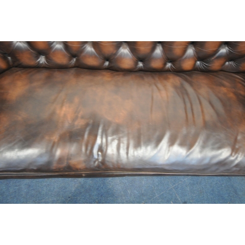 1269 - A BROWN LEATHER CHESTERFIELD DROP END SOFA, with buttoned backrest and armrests, length 203cm x dept... 