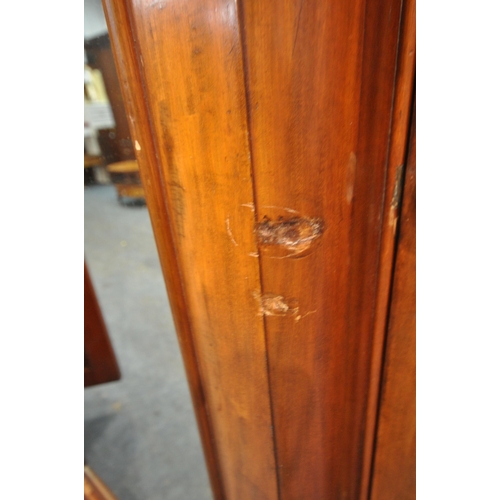 1270 - A VICTORIAN FLAME MAHOGANY BREAKFRONT TRIPLE DOOR WARDROBE, with fielded panel doors, flanking a cen... 