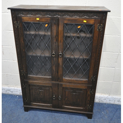 1276 - A JAYCEE OAK DOUBLE DOOR TV CABINET, with a fall front door, width 94cm x depth 54cm x height 104cm,... 