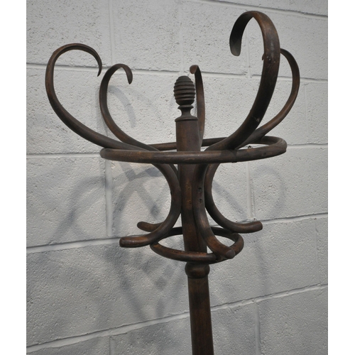 1277 - A BENTWOOD HAT / COAT STAND, with five arms, height 193cm, along with a wall standing coat / hat sta... 