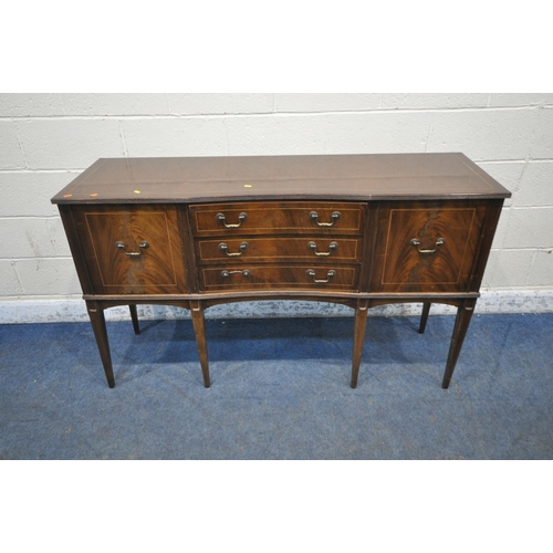 1279 - A 20TH CENTURY MAHOGANY OVAL EXTENDING DINING TABLE, with one additional leaf, raised on turned supp... 