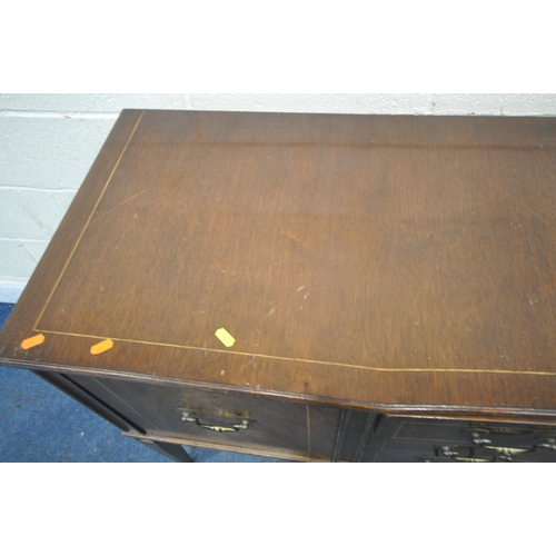 1279 - A 20TH CENTURY MAHOGANY OVAL EXTENDING DINING TABLE, with one additional leaf, raised on turned supp... 