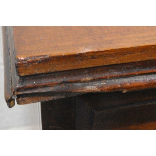 1283 - A 20TH CENTURY MAHOGANY KNEEHOLE DESK, with a green leather writing surface, fitted with nine assort... 