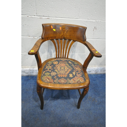 1283 - A 20TH CENTURY MAHOGANY KNEEHOLE DESK, with a green leather writing surface, fitted with nine assort... 