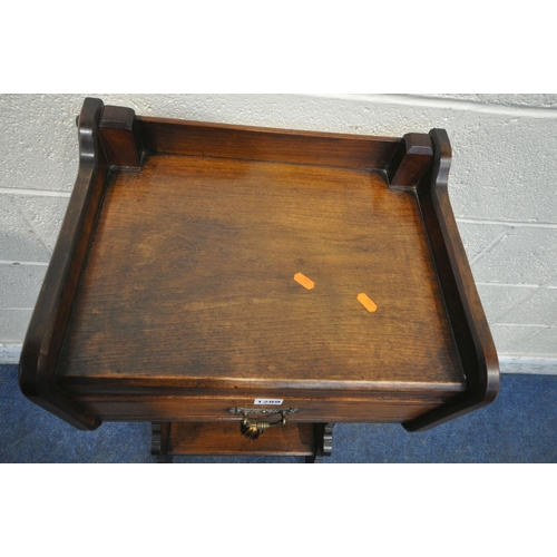 1289 - A 20TH CENTURY OAK CABINET, with a single drawer, above double cupboard doors, shaped front legs, un... 