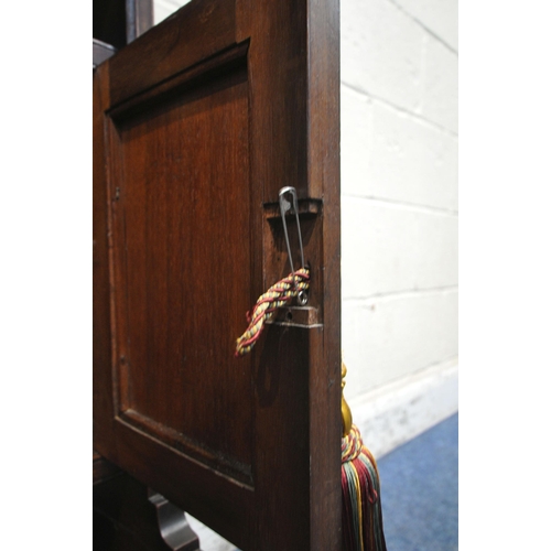 1289 - A 20TH CENTURY OAK CABINET, with a single drawer, above double cupboard doors, shaped front legs, un... 