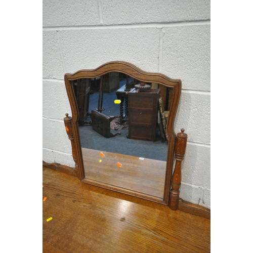 1293 - A LATE 20TH CENTURY OAK DRESSING TABLE, with a single mirror, three drawers, raised on shaped legs, ... 