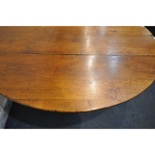 1298 - AN 18TH CENTURY STYLE OAK WAKE TABLE, raised on block and turned legs, open width 143cm x closed wid... 