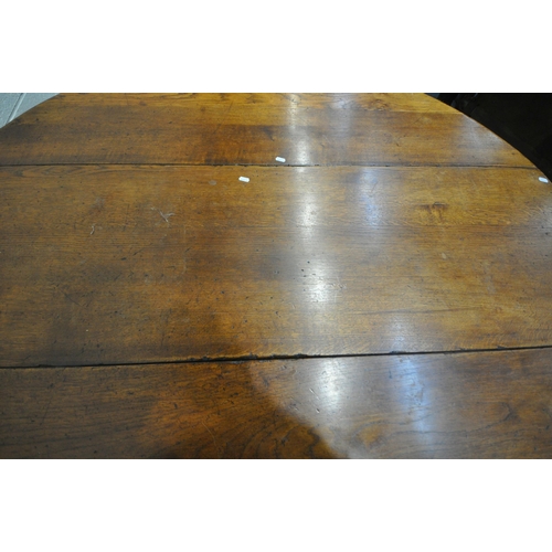 1298 - AN 18TH CENTURY STYLE OAK WAKE TABLE, raised on block and turned legs, open width 143cm x closed wid... 