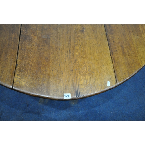 1298 - AN 18TH CENTURY STYLE OAK WAKE TABLE, raised on block and turned legs, open width 143cm x closed wid... 