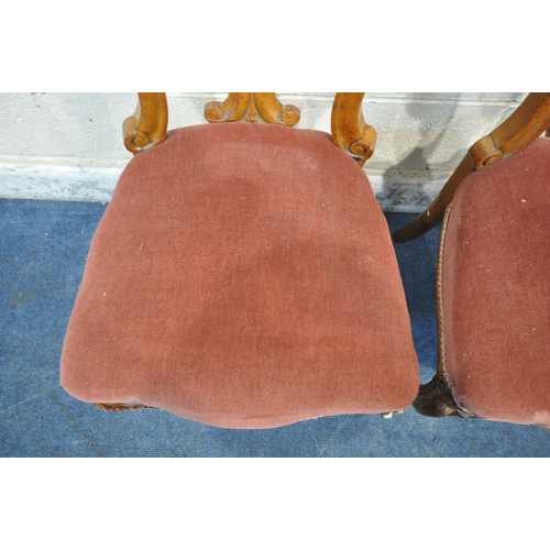 1303 - A SET OF THREE VICTORIAN CHAIRS, with shaped backrest, pink upholstery, raised on cabriole front leg... 