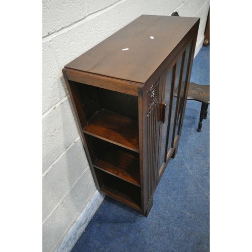 1304 - A 20TH CENTURY OAK BOOKCASE, with a single glazed door, width 69cm x depth 31cm x height 98cm, along... 