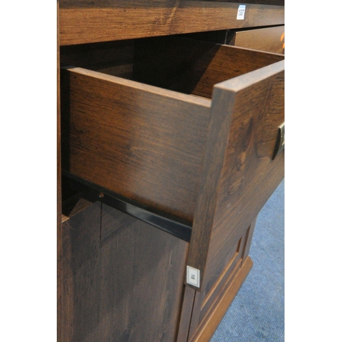 1307 - A MODERN SIDEBOARD, fitted with two drawers, above double cupboard doors, width 100cm x depth 44cm x... 