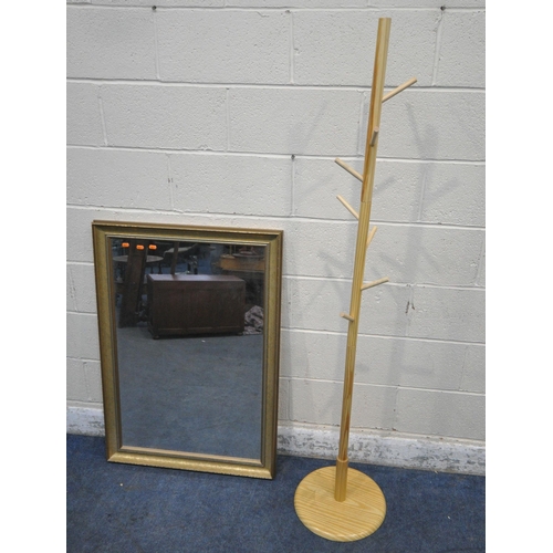 1310 - A GILT FRAME RECTANGULAR WALL MIRROR, 104cm x 73cm, along with a modern coat stand, with eight pegs ... 