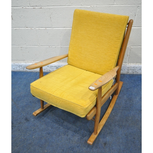 1312 - A MID CENTURY ELM ROCKING CHAIR, with yellow upholstered cushions, width 65cm x depth 86cm x height ... 