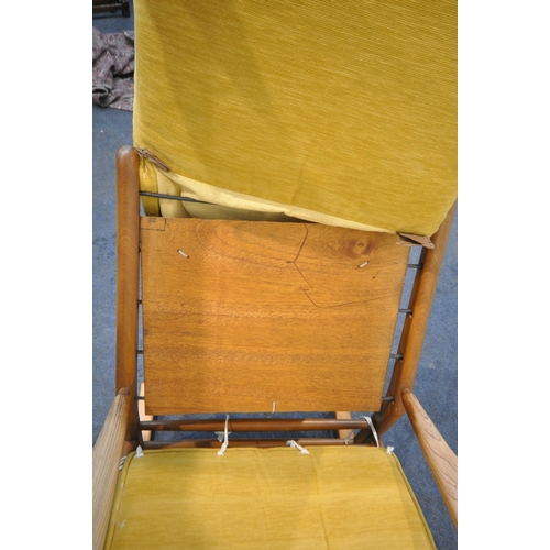 1312 - A MID CENTURY ELM ROCKING CHAIR, with yellow upholstered cushions, width 65cm x depth 86cm x height ... 