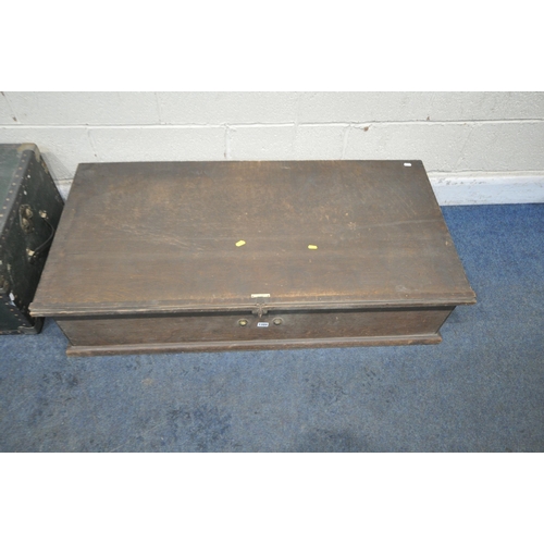 1320 - A LOW WOODEN LIDDED TRUNK, width 122cm x depth 61cm x height 29cm, another trunk, and a set of woode... 