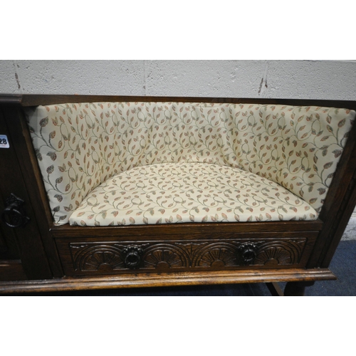 1328 - A LATE 20TH CENTURY OAK TELEPHONE SEAT, with foliate upholstery, a single linenfold door, and a sing... 