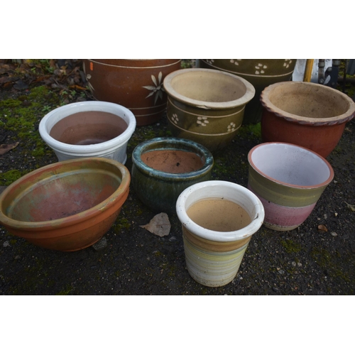 1002 - A SELECTION OF NINE GLAZED PLANT POTS, of various sizes and styles (9)