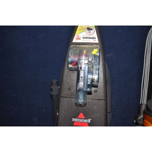 1061 - A DYSON DC25 UPRIGHT BALL VACUUM CLEANER and a Bissell Pro Heat carpet cleaner (both PAT pass and wo... 