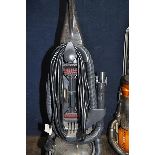 1061 - A DYSON DC25 UPRIGHT BALL VACUUM CLEANER and a Bissell Pro Heat carpet cleaner (both PAT pass and wo... 