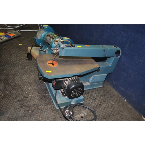 1064 - A CLARKE METALWORKER BENCH GRINDER with fine and polishing discs fitted, a bag of loose discs, and a... 