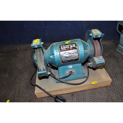 1064 - A CLARKE METALWORKER BENCH GRINDER with fine and polishing discs fitted, a bag of loose discs, and a... 