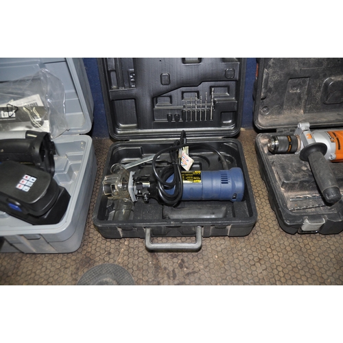 1065 - A SELECTION OF BOXED POWER TOOLS comprising of a Worx WX8HD drill, a Black and Decker angle grinder,... 