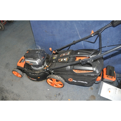 1068 - A REDBACK E146CV 40V CORDLESS SELF PROPELLED LAWN MOWER, with one battery, charger, a belt pack and ... 