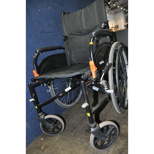 1082 - A SOMA AGILE FOLDING WHEELCHAIR with two footrests