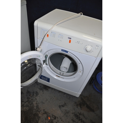 1098 - AN INDESIT IDV65 6kg TUMBLE DRYER, width 60cm, depth 55cm, height 85cm and a Panasonic Microwave (bo... 