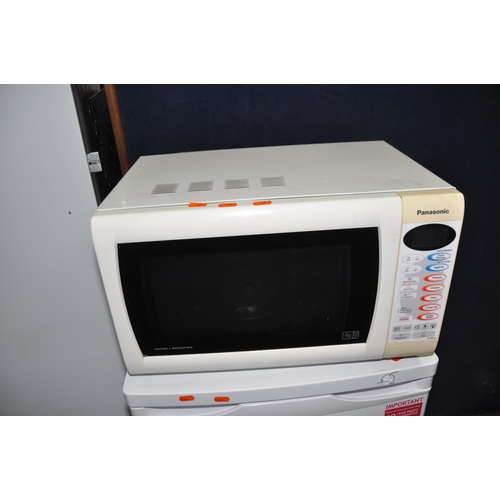 1098 - AN INDESIT IDV65 6kg TUMBLE DRYER, width 60cm, depth 55cm, height 85cm and a Panasonic Microwave (bo... 