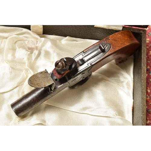 275 - AN EARLY 19TH CENTURY ENGLISH FLINTLOCK POCKET PISTOL BY BRUNN OF LONDON, plain walnut grip, fitted ... 