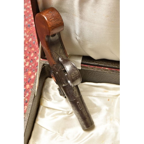 275 - AN EARLY 19TH CENTURY ENGLISH FLINTLOCK POCKET PISTOL BY BRUNN OF LONDON, plain walnut grip, fitted ... 