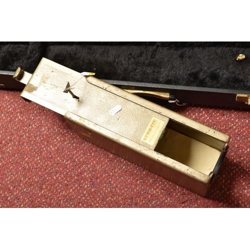 290 - A BLACK EBONISED SHOTGUN CASE AND A GUNMATE GUN KEEP, with brass banding and a furry padded interior... 