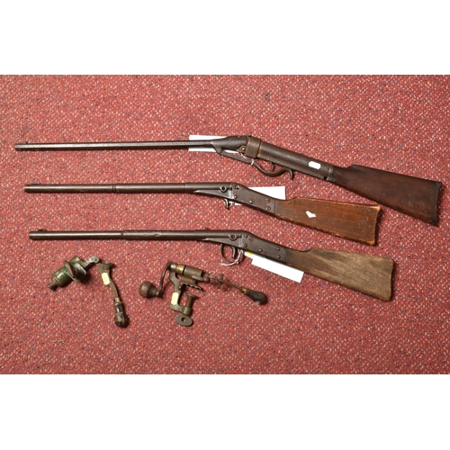 291 - AN EARLY 20TH CENTURY AIR RIFLE, TWO CHILDREN'S GUNS AND TWO 12 BORE CARTRIDGE LOADERS, the air rifl... 