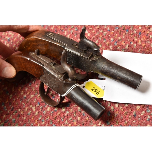 296 - TWO 19TH CENTURY FLINTLOCK POCKET PISTOLS, both with plain walnut grips, one marked Pritchard and fi... 