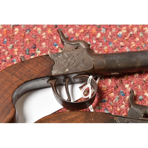 296 - TWO 19TH CENTURY FLINTLOCK POCKET PISTOLS, both with plain walnut grips, one marked Pritchard and fi... 